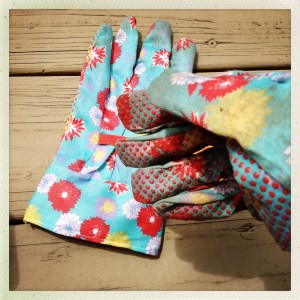 Now it’s time to panic a little that the cactus won’t actually fit inside of the tea tin.  After that, it’s time to think about how you really should have thought of that before.  Then, it’s time to decide that you are going to make the cactus fit into the tea tin, no matter what, which means it’s time to panic a little about how you are going to get the cactus inside of the tea tin without lacerating your hands so badly that you look like one of the illustrations of lepers that seemed to be on every page of your catechism book when you went to Our Lady of Sorrows Catholic School.  So you are going to need gloves, and those gloves need to be cute, which is the most important part of this step.   That may seem deceptively unimportant, but, I can assure you, that is pure deception.  You need to get some cute gardening gloves because there is nothing more important, in any situation, than accessories.  Coco Chanel once said that "It is the unseen, unforgettable, ultimate accessory of fashion that heralds your arrival and prolongs your departure," but I like to think about accessories a little more concretely.  Accessories are absolutely necessary, because, if paired with a chunky bracelet and a fashionable belt, no one will be able to tell that you’re wearing your pajamas.  Coco Chanel said that, too. 